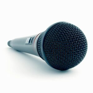 Close-up of a condenser microphone illustrating sound recording equipment in a studio setting.